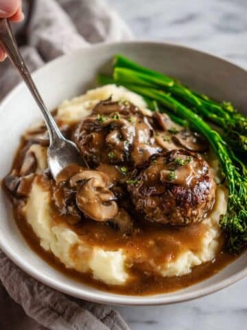 Smothered Rissoles with Mushroom Gravy over Mashed Potatoes Recipe