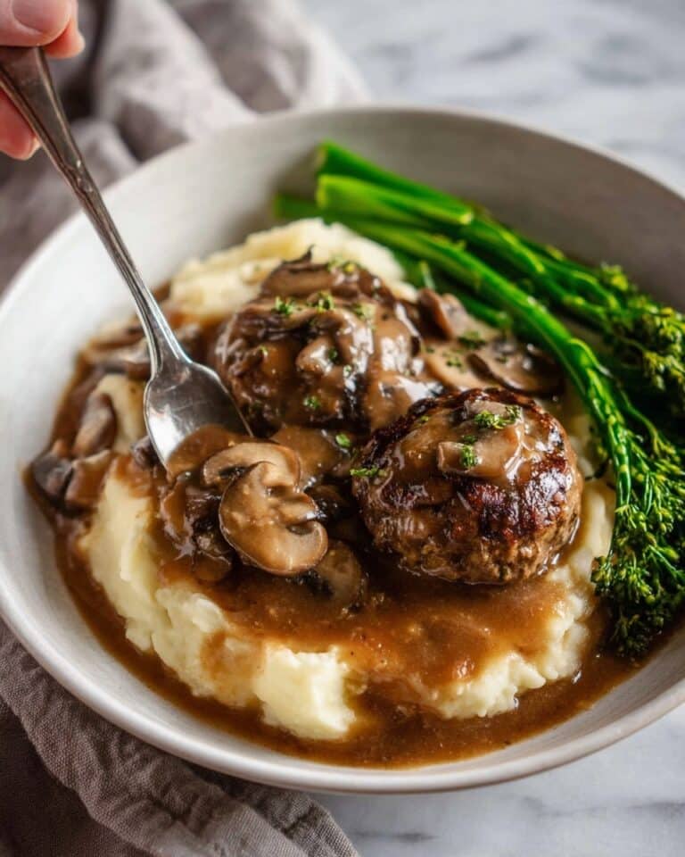 Smothered Rissoles with Mushroom Gravy over Mashed Potatoes Recipe