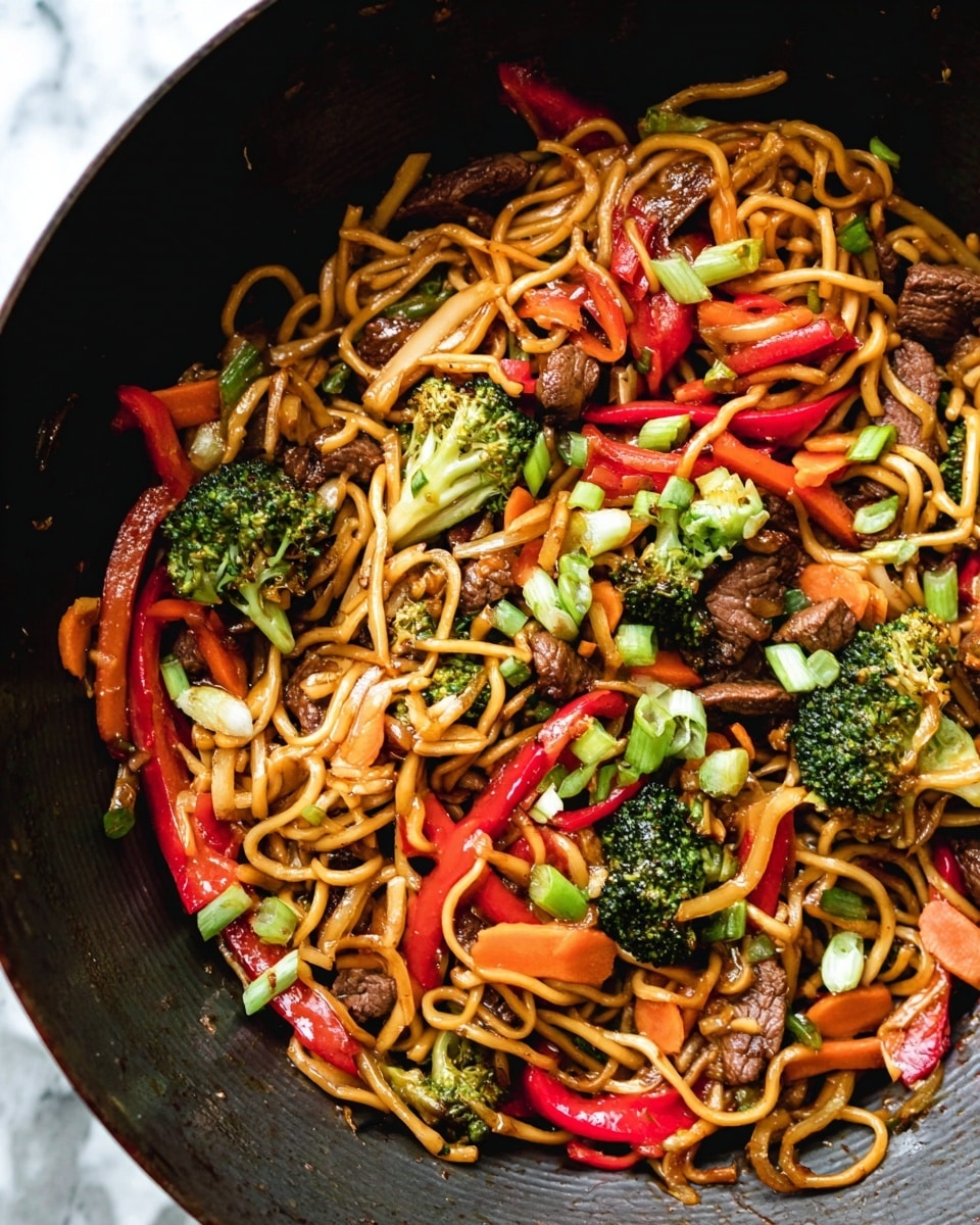 A close-up top view of a white bowl filled with a colorful stir-fry dish featuring thick yellow noodles that twist and curl around vibrant green broccoli florets, bright red bell pepper slices, and slices of light brown cooked meat. Scattered light green chopped scallions add freshness on top, while the glossy texture of the noodles and meat reflects the light, showing they are well-cooked and saucy. A pair of wooden chopsticks held by a woman's hand is seen lifting some noodles and a piece of meat from the bowl. The bowl sits on a white marbled surface, with some scattered sliced scallions nearby. photo taken with an iphone --ar 4:5 --v 7