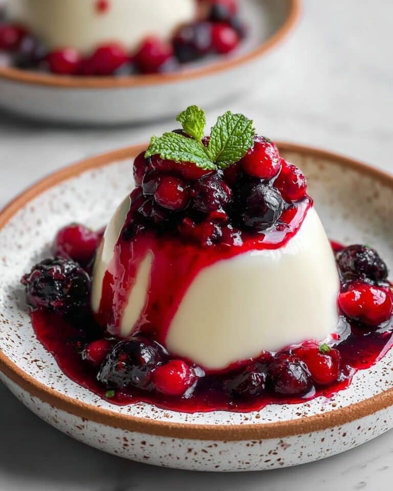 Creamy Italian Panna Cotta with Vibrant Berry Sauce Recipe