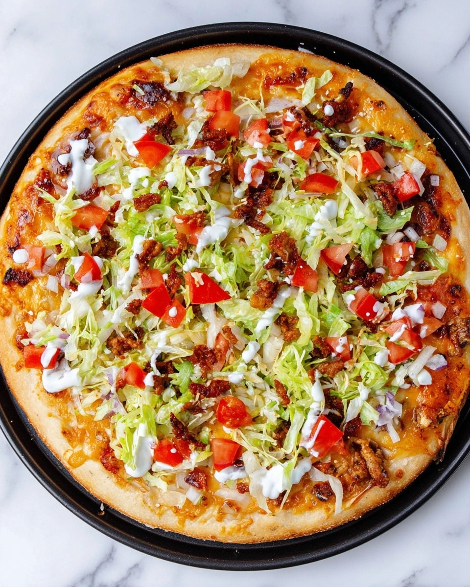 A round pizza is shown on a white marbled surface, inside a black round pan. The pizza has three main layers: the bottom is a light golden-brown baked crust with some darker toasted spots, the middle layer is melted browned cheese barely visible under toppings, and the top layer is a mix of green shredded lettuce, red diced tomatoes, small crispy brown bits of meat, and white dollops of creamy sauce scattered unevenly across the surface. The toppings cover most of the pizza, with some crust visible around the edges. The photo taken with an iphone --ar 4:5 --v 7
