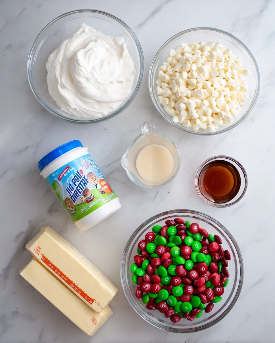 A top view image shows several ingredients arranged on a white marbled surface. Starting from the top left, there is a glass bowl filled with white cream, next to it on the right is a glass bowl full of white chocolate chips. Below these two bowls, from left to right, there is a small glass measuring cup with light beige liquid, a white jar of Jet-Puffed marshmallow creme with a blue lid, and a small glass bowl with brown vanilla extract. At the bottom left of the image, there are two sticks of butter with orange measurement markings. To the right, there is a clear glass bowl filled with red and green M&M candies. photo taken with an iphone --ar 4:5 --v 7