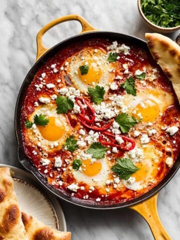 Spicy Shakshuka with Poached Eggs in Tomato and Pepper Sauce Recipe